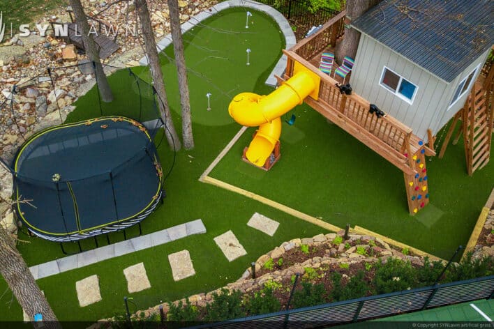 SYNLawn Western New York residential backyard treehouse trampoline